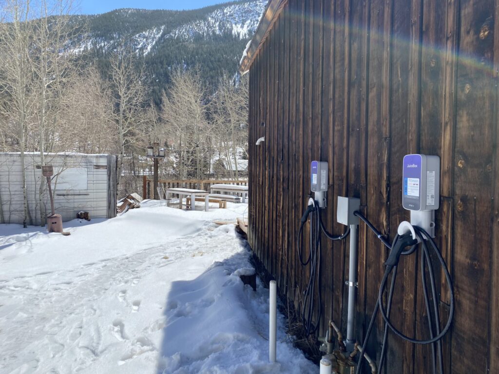 EVMATCH CHARGERS AT BREAD BAR IN THE OLD MINING TOWN OF SILVER PLUME, COLORADO. VISITORS TO THE AREA ENJOY RESORT SKIING, BACKCOUNTRY SKIING AND HIKING THE FAMED 14ERS, BUT, UNTIL NOW, NOT MANY EV CHARGING OPTIONS EXISTED.