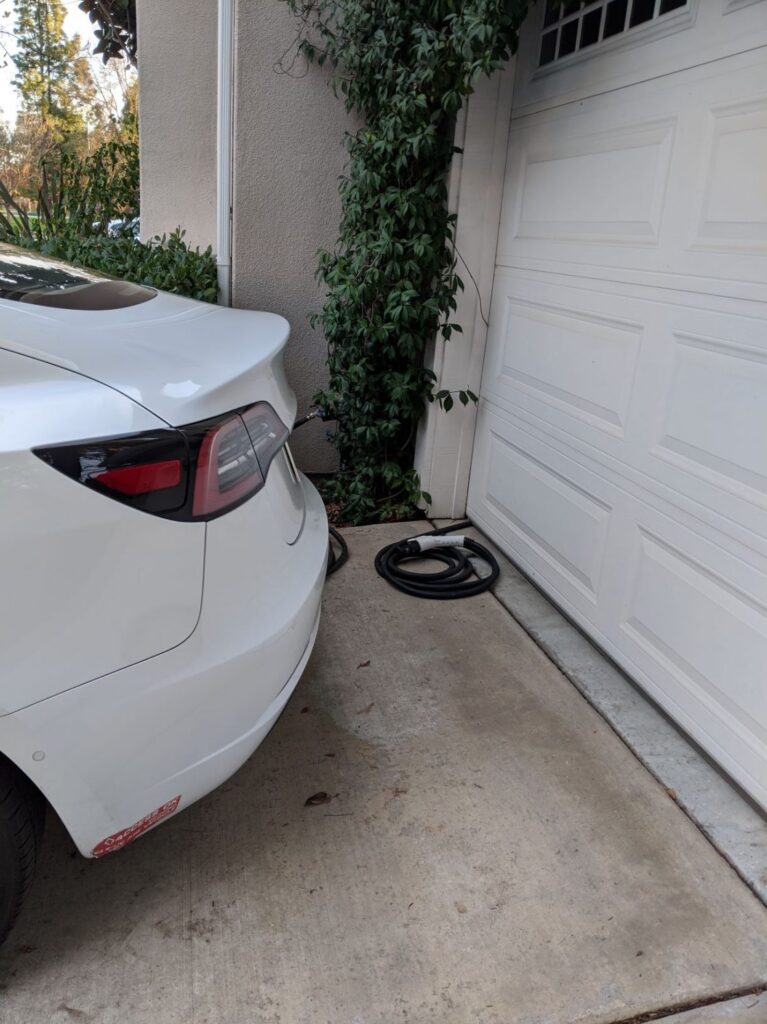ANTHONY FEEDS HIS PLUG UNDER HIS GARAGE DOOR SO HE CAN SHARE IT