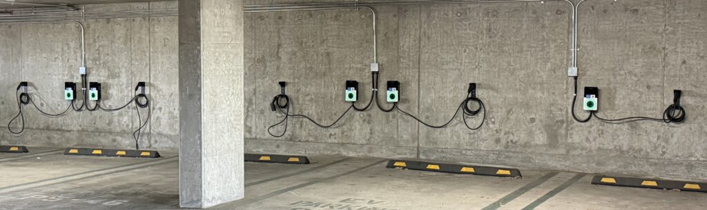 EVmatch multi-family apartment EV chargers installed in a garage, wall-mounted